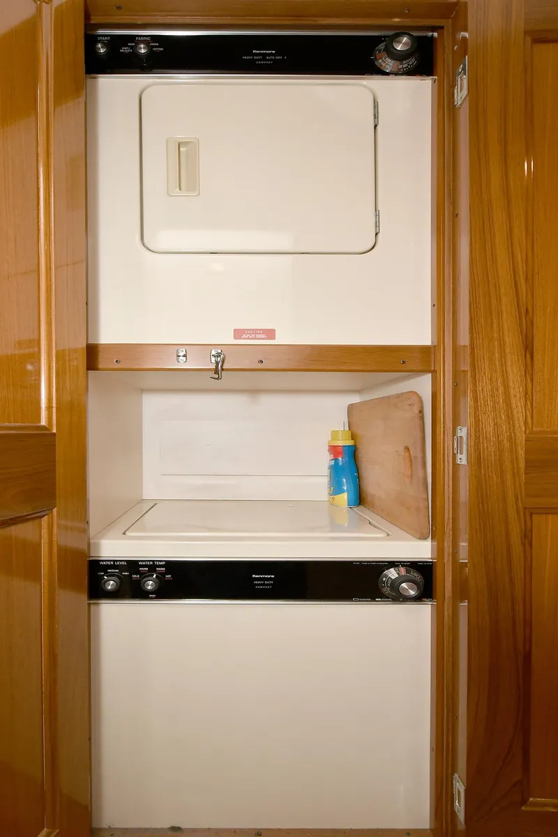 Slide: The Image of Stacked washer and dryer in 1997 Viking 47 Convertible yacht. - 31
