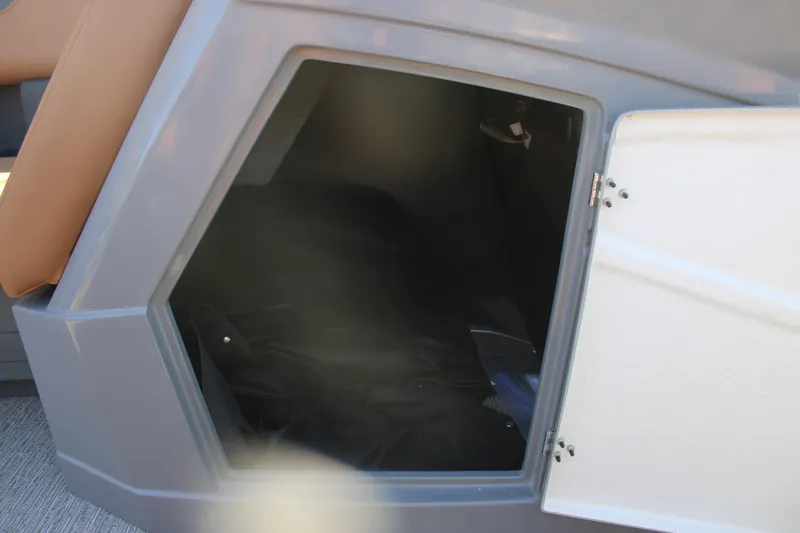 Slide: The Image of Open storage compartment in 2026 Starcraft SLS 3 RL boat. - 23