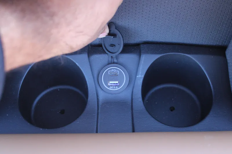 Slide: The Image of Cup holders and USB port in 2026 Starcraft SLS 3 RL vehicle interior. - 27