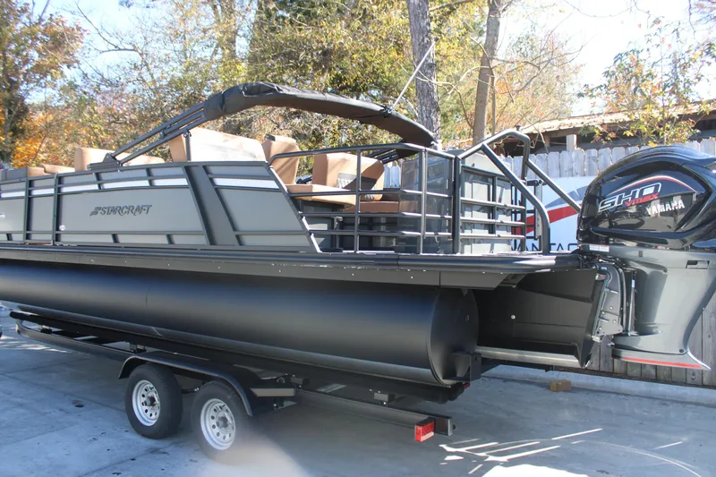 Slide: The Image of 2026 Starcraft SLS 3 RL pontoon boat with Yamaha engine on trailer. - 3