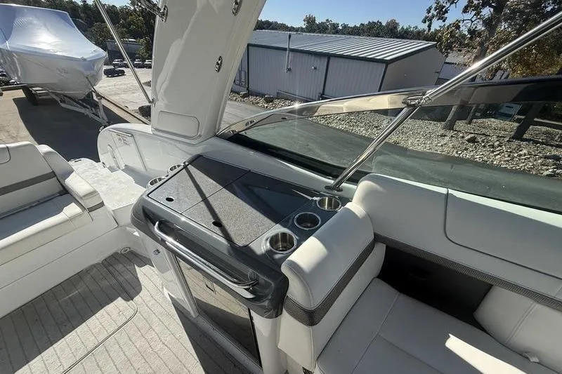 Slide: The Image of 2015 Formula 350 Crossover Bowrider interior with seating and console. - 10