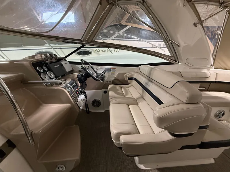 Slide: The Image of Interior of a 2015 Formula 310 Sun Sport yacht with leather seating. - 16