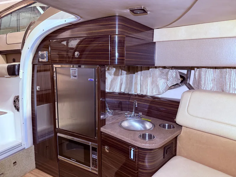Slide: The Image of Interior of a 2015 Formula 310 Sun Sport yacht with kitchenette. - 19