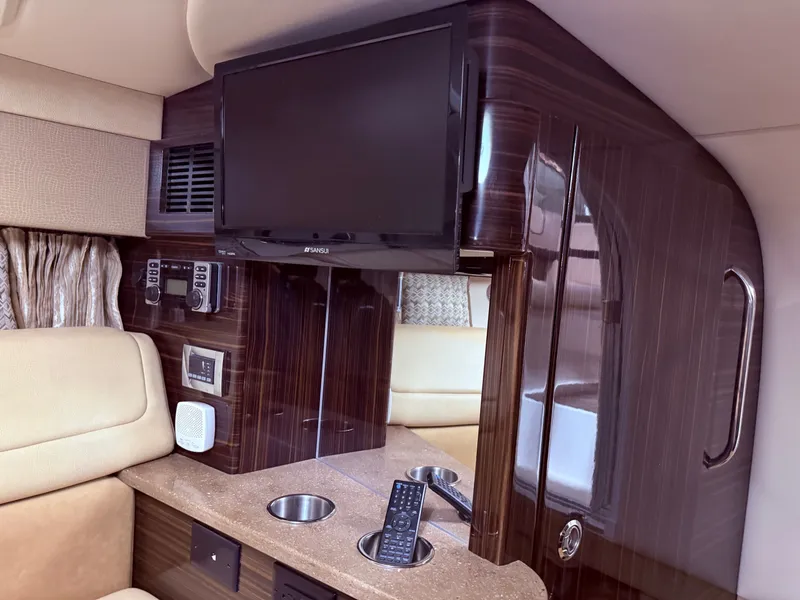 Slide: The Image of Interior of 2015 Formula 310 Sun Sport with TV and controls. - 21