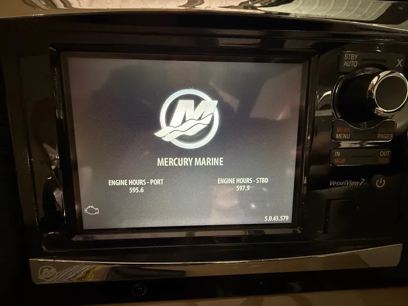 Slide: The Image of Mercury Marine display on 2015 Formula 310 Sun Sport boat. - 24