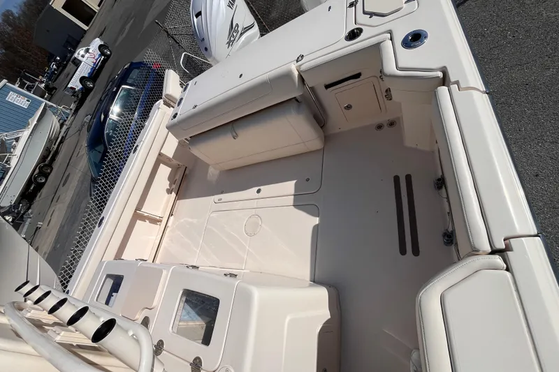 Slide: The Image of 2022 Grady-White Canyon 336 boat deck, featuring spacious seating and storage areas. - 15