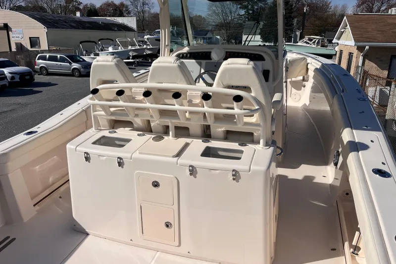 Slide: The Image of 2022 Grady-White Canyon 336 boat interior with seating and storage compartments. - 3