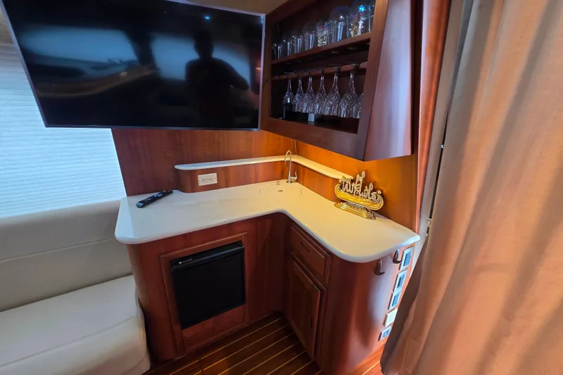 Slide: The Image of Luxurious interior of 2005 Meridian 580 Pilothouse yacht with elegant wood flooring. - 11