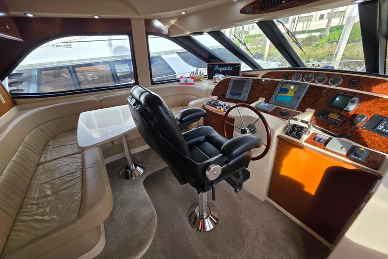 Slide: The Image of Luxurious interior of 2005 Meridian 580 Pilothouse with leather seating and elegant wood finishes. - 20