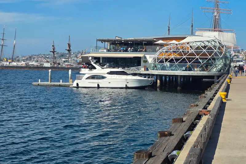 Slide: The Image of 2005 Meridian 580 Pilothouse yacht cruising on open water. - 3