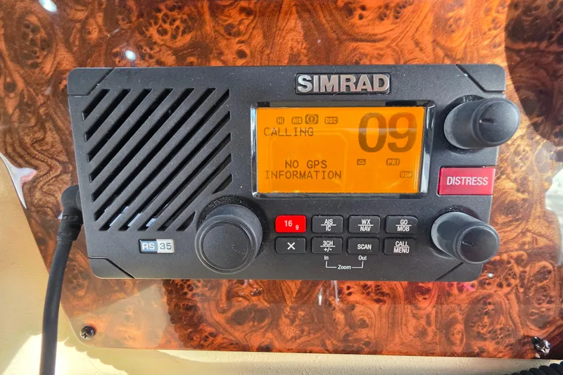 Slide: The Image of Luxurious 2005 Meridian 580 Pilothouse interior with plush seating and advanced navigation controls. - 53