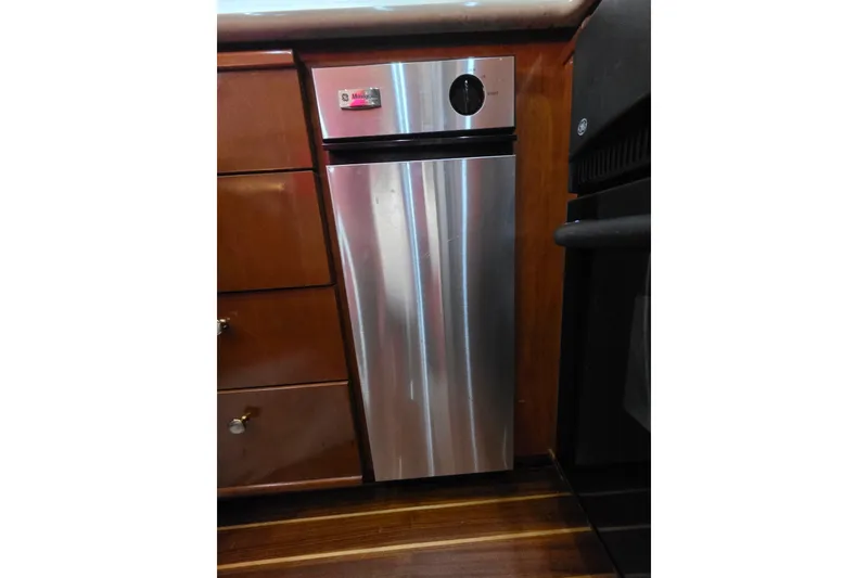 Slide: The Image of Built-in dishwasher in 2005 Meridian 580 Pilothouse yacht kitchen. - 61