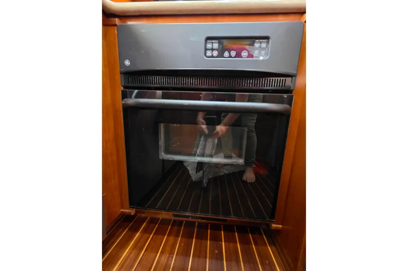 Slide: The Image of Stainless steel appliance in 2005 Meridian 580 Pilothouse kitchen area. - 62