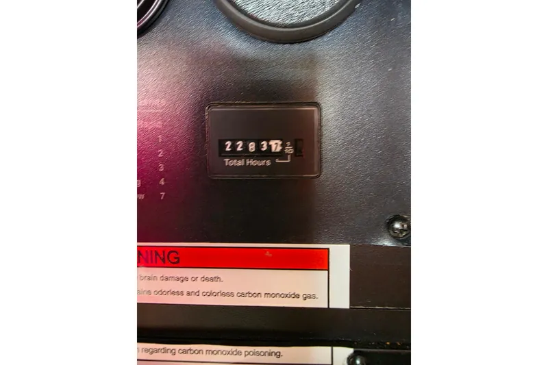 Slide: The Image of Electrical control panel on a 2005 Meridian 580 Pilothouse yacht, featuring labeled switches and voltmeter. - 73