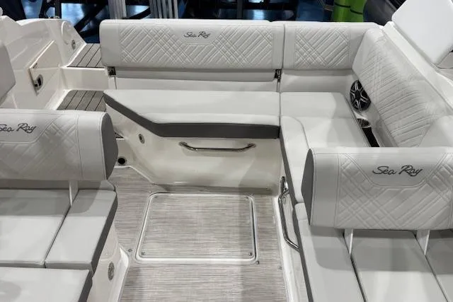 Slide: The Image of 2026 Sea Ray SDX 230 boat interior with spacious seating and modern design. - 11