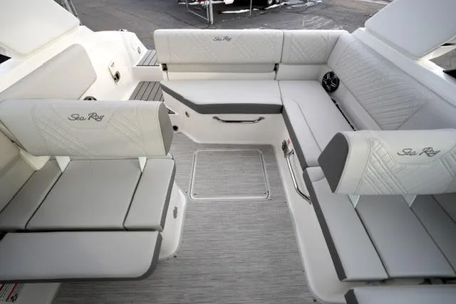 Slide: The Image of 2026 Sea Ray SDX 230 boat interior with luxurious seating and modern design. - 19