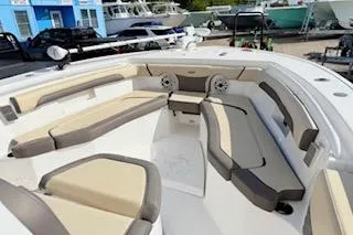 Slide: The Image of 2021 Tidewater 272 CC Adventure boat with spacious seating and modern design. - 15