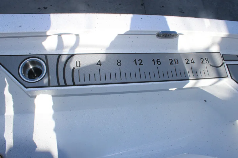 Slide: The Image of Ruler on 2026 Xpress H20B Bay boat deck, measuring up to 28 inches. - 15