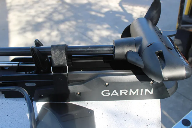 Slide: The Image of Garmin trolling motor on 2026 Xpress H20 boat, secured with strap. - 28