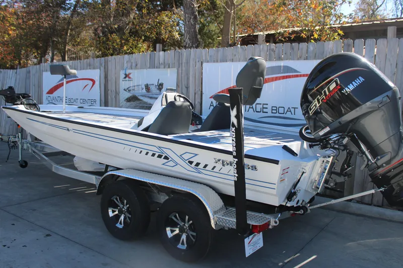 Slide: The Image of 2026 Xpress H20 boat with Yamaha engine on a trailer at Advantage Boat Center. - 3
