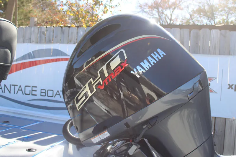 Slide: The Image of Yamaha SHO VMAX engine on 2026 Xpress H20 boat, outdoor setting. - 4