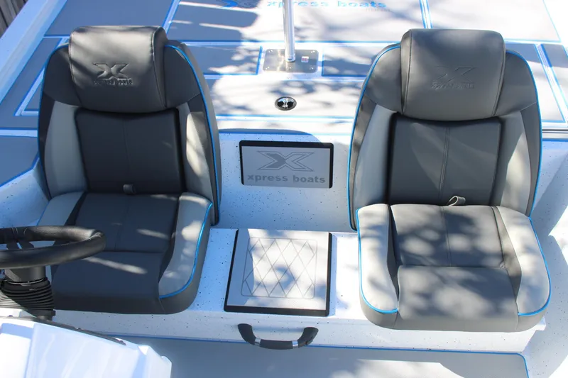 Slide: The Image of Two comfortable seats on a 2026 Xpress H20 boat, featuring sleek design and branding. - 9