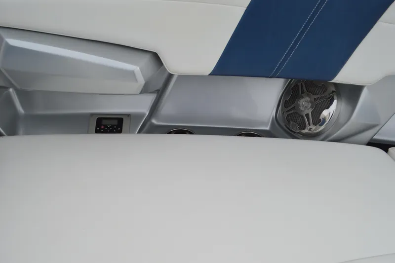 Slide: The Image of Interior of 2013 Chaparral 327 SSX boat with speaker and control panel. - 10