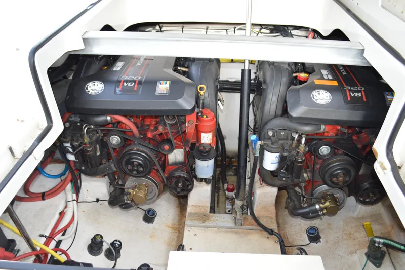 Slide: The Image of Engine compartment of a 2013 Chaparral 327 SSX boat with dual V8 engines. - 47