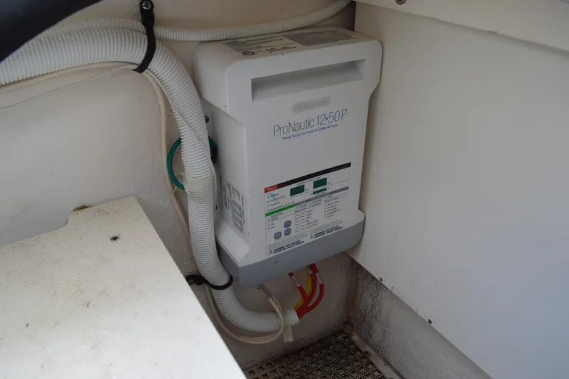 Slide: The Image of ProNautic 12:50P charger in 2013 Chaparral 327 SSX boat interior. - 54