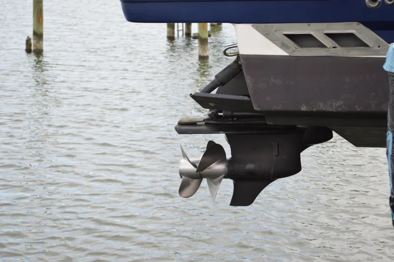 Slide: The Image of 2013 Chaparral 327 SSX boat propeller above water surface. - 55