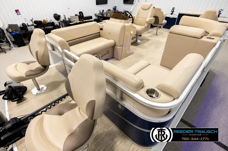 Slide: The Image of Luxurious 2020 Avalon VEN FNC pontoon boat interior with beige seating and modern design. - 10