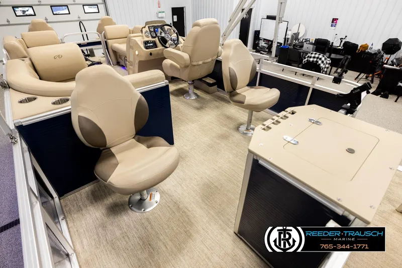 Slide: The Image of Interior of 2020 Avalon VEN FNC boat with beige seating and control panel. - 11