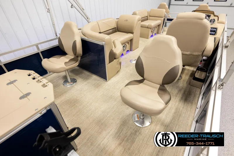 Slide: The Image of Luxurious interior of 2020 Avalon VEN FNC pontoon boat with beige seating. - 12