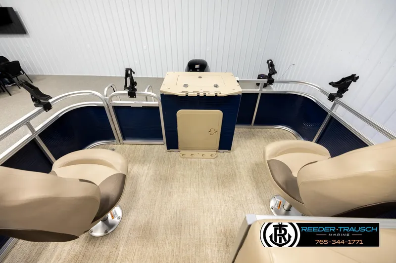Slide: The Image of 2020 Avalon VEN FNC boat interior with beige seats and blue paneling. - 15