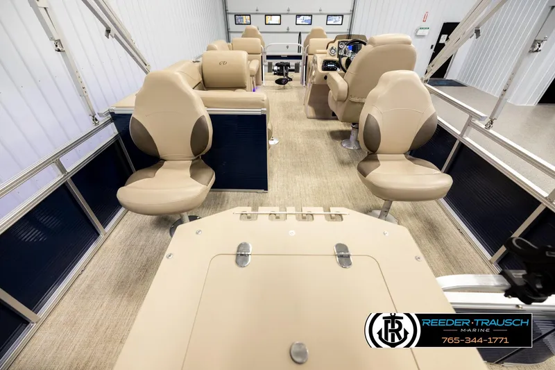 Slide: The Image of Interior of 2020 Avalon VEN FNC boat with beige seating and modern dashboard. - 16