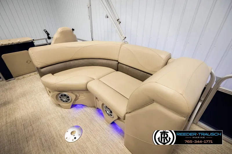 Slide: The Image of Luxurious beige seating on 2020 Avalon VEN FNC boat with blue LED lighting. - 20
