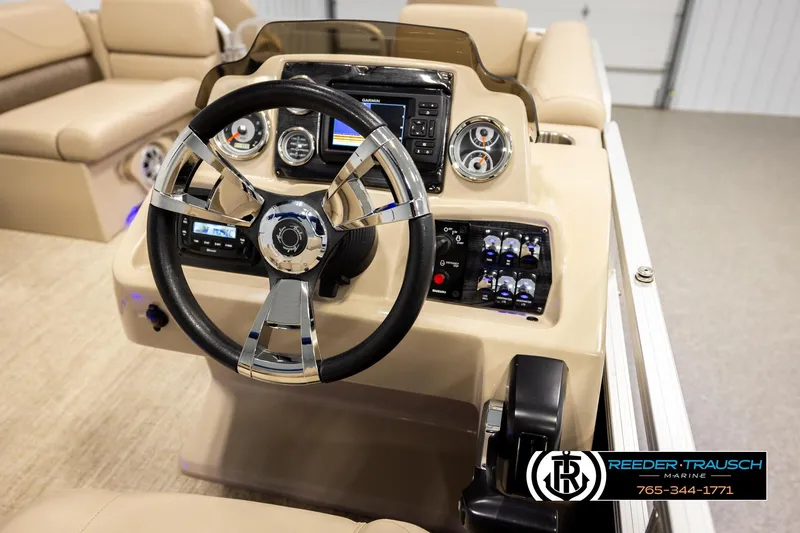 Slide: The Image of Steering console of 2020 Avalon VEN FNC boat with modern controls and gauges. - 31