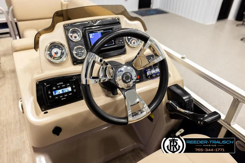 Slide: The Image of Steering console of 2020 Avalon VEN FNC boat with modern controls and gauges. - 32