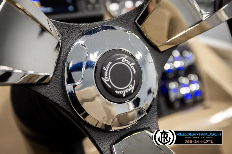 Slide: The Image of Close-up of 2020 Avalon VEN FNC steering wheel with chrome accents. - 33