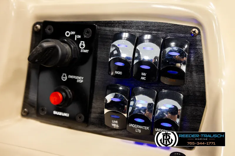 Slide: The Image of Control panel of 2020 Avalon VEN FNC boat with switches and emergency stop button. - 37