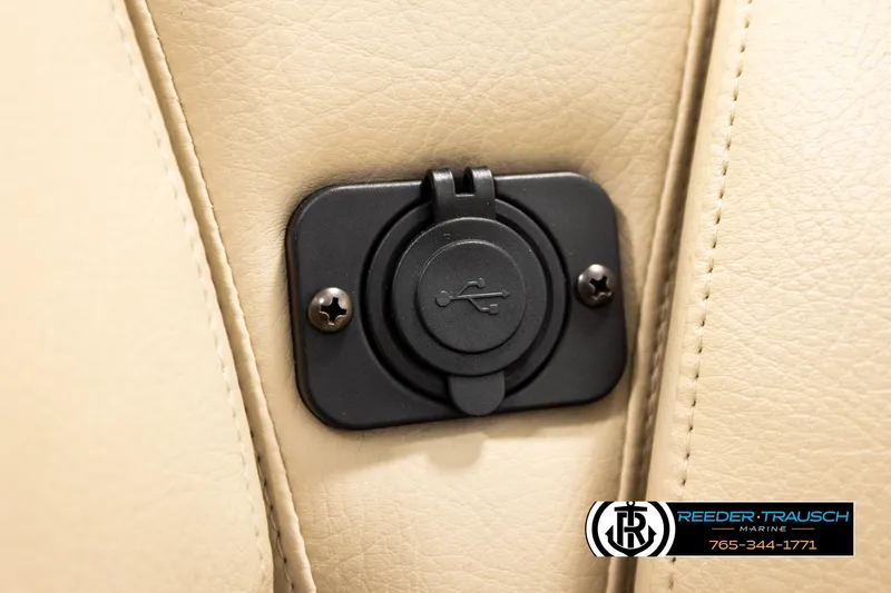 Slide: The Image of USB port on beige leather seat of 2020 Avalon VEN FNC boat. - 43