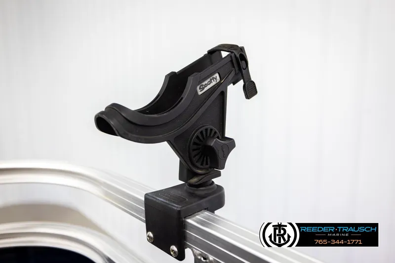 Slide: The Image of Rod holder mounted on Avalon VEN FNC 2020 boat railing, Reeder-Trausch Marine branding visible. - 46