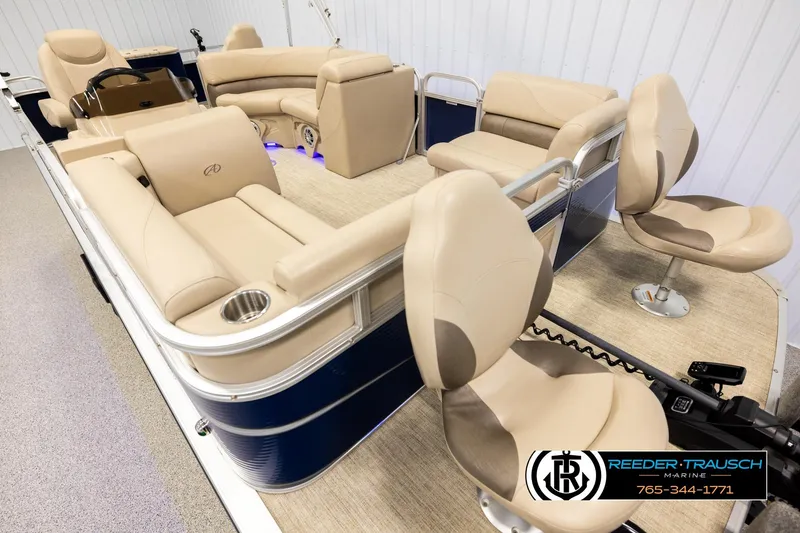 Slide: The Image of 2020 Avalon VEN FNC pontoon boat with beige seating and modern interior design. - 9