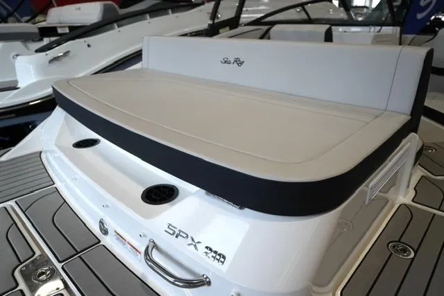 Slide: The Image of 2026 Sea Ray SPX 210 boat interior, featuring sleek seating and modern design. - 19