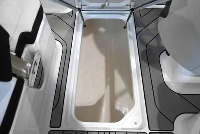 Slide: The Image of 2026 Sea Ray SPX 210 boat storage compartment with sleek design and modern features. - 20