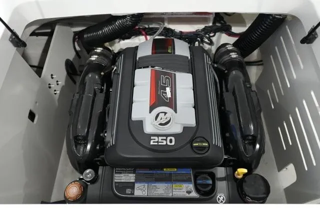 Slide: The Image of 2026 Sea Ray SPX 210 engine compartment featuring a powerful 4.5L 250 HP engine. - 21