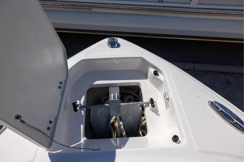 Slide: The Image of Anchor storage compartment on 2022 Chaparral 23 SSi OB boat. - 10