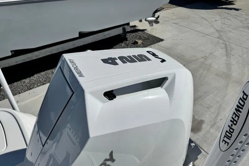 Slide: The Image of 2026 Caymas 28 HB with Mercury 400R outboard engine and Power-Pole anchor system. - 11