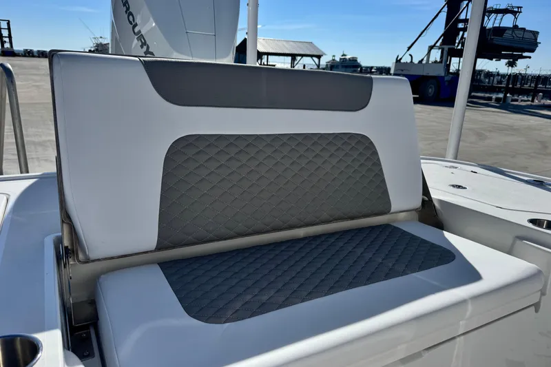 Slide: The Image of 2026 Caymas 28 HB boat seat with gray diamond-pattern upholstery. - 14