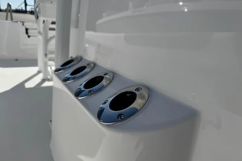 Slide: The Image of 2026 Caymas 28 HB boat rod holders in sleek, modern design. - 31